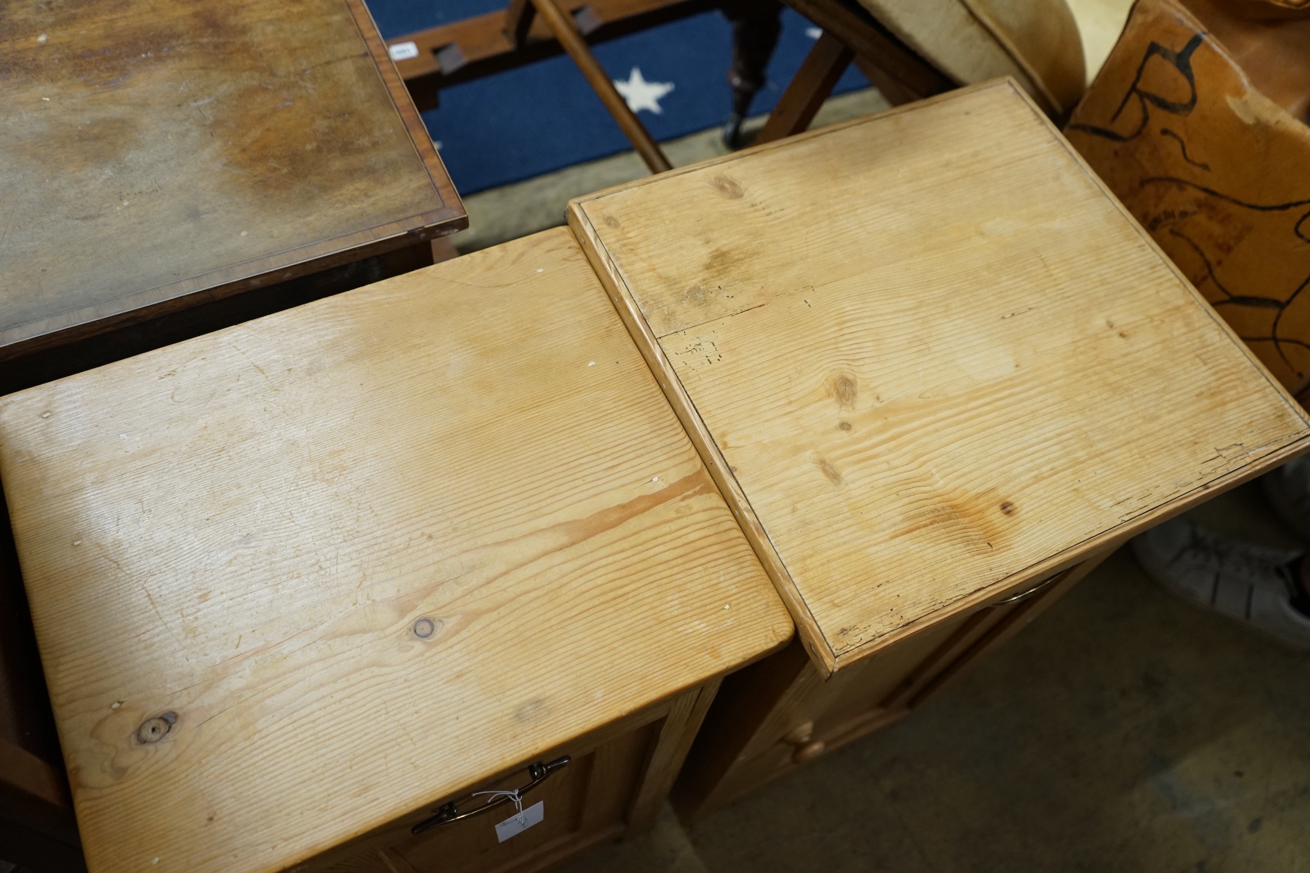 A near pair of 19th century continental pine bedside cabinets, larger width 40cm, depth 38cm, height 76cm